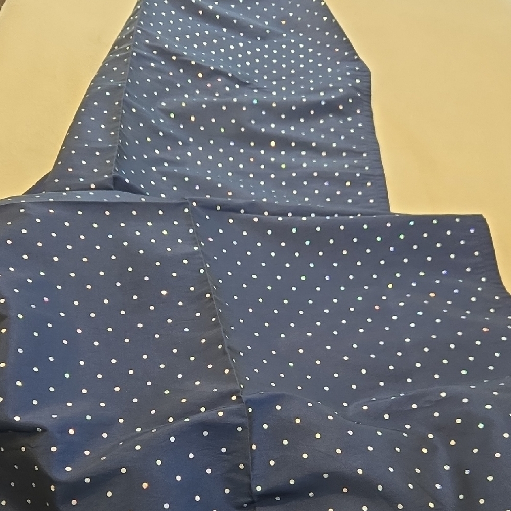 A Pair of Navy curtains with sparkly polka dot pattern